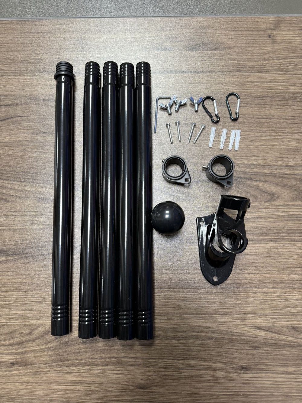 Full flag pole kit laid out with all hardware